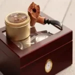 Cigar humidor with cigar accessories on top