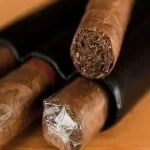 Cigars sitting on top of each other