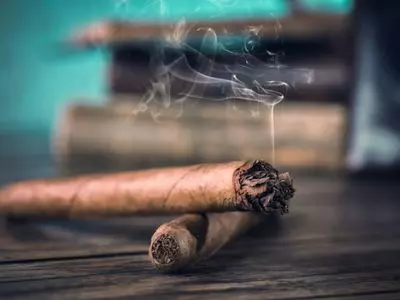 two small cigars on top of each other