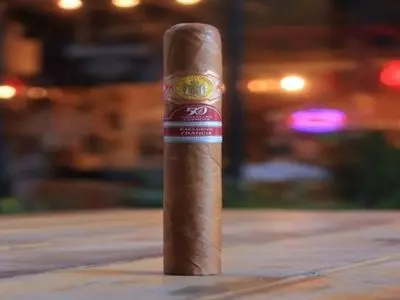 A cigar sitting on a table
